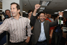 Los Angeles Times reporter Ruben Vives, right, celebrates with fellow reporter Jeff Gottlieb after they won the 2011 Pulitzer Prize for Public Service. (Katie Falkenberg / Los Angeles Times / Associated Press / April 18, 2011)