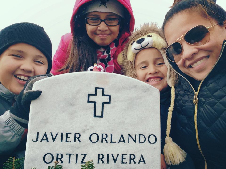 Javier Ortiz-Rivera's family at Arlington National Cemetery. 