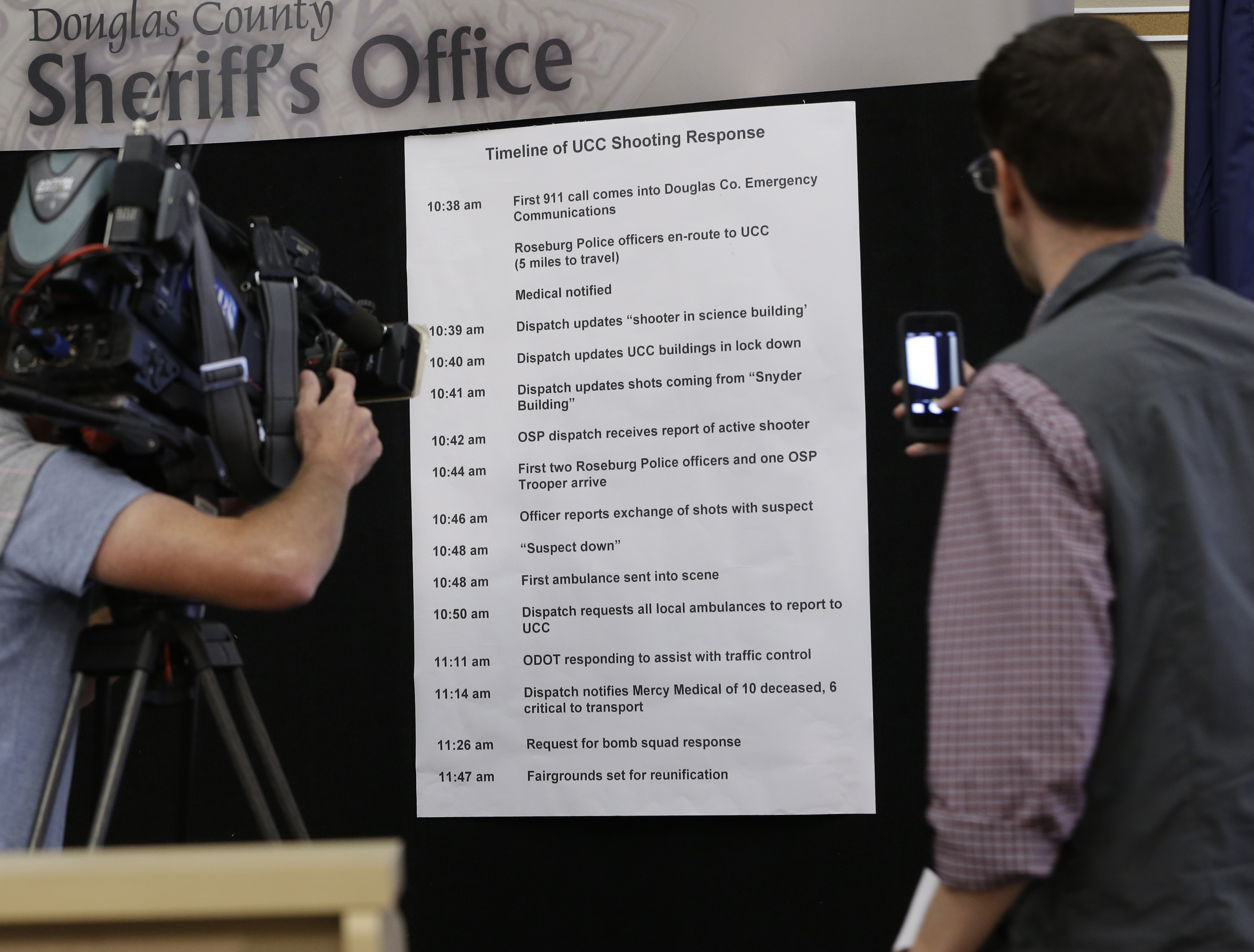 A timeline of law enforcement response to the Umpqua Community College shooting is posted for the media at a news conference, Saturday, Oct. 3, 2015, in Roseburg, Oregon. (AP Photo/Rich Pedroncelli)