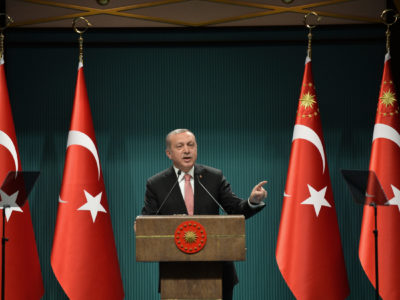 Turkey's President Recep Tayyip Erdogan speaks after an emergency meeting of the government in Ankara, Turkey, late Wednesday, July 20, 2016.  (AP Photo)