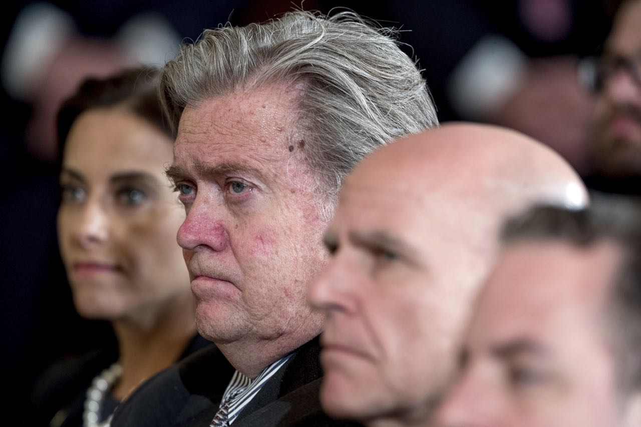 From left, White House Senior Counselor for Economic Initiatives Dina Powell, President Donald Trump's White House Senior Adviser Steve Bannon and National Security Adviser H.R. McMaster attend a news conference with President Donald Trump and NATO Secretary General Jens Stoltenberg in the East Room at the White House, Wednesday, April 12, 2017, in Washington. (AP Photo/Andrew Harnik)