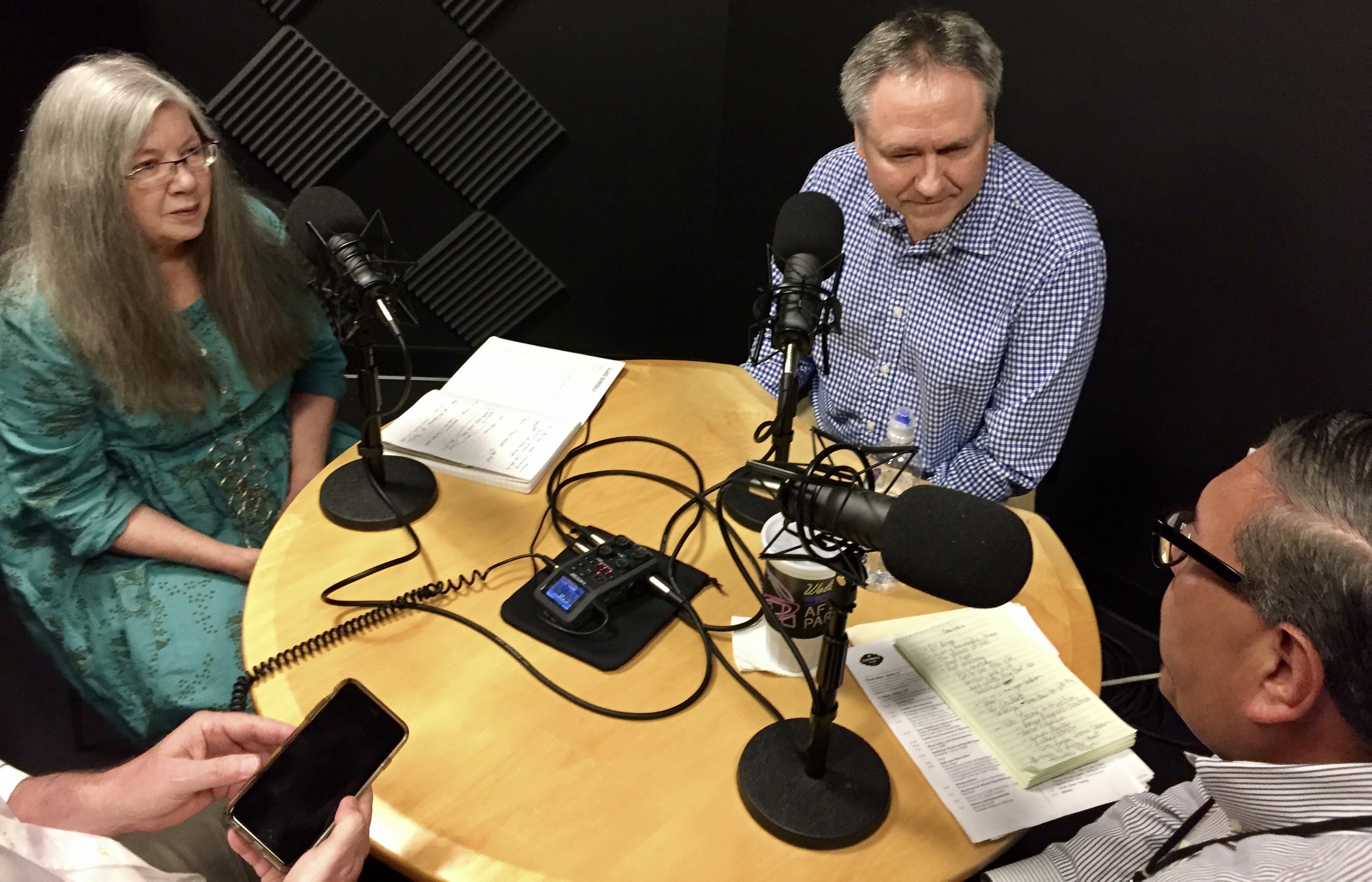 From left, Alison Cook, J.C. Reid and Greg Morago film the third episode of the Houston Chronicle's BBQ podcast. (Photo by Kristen Hare/Poynter)