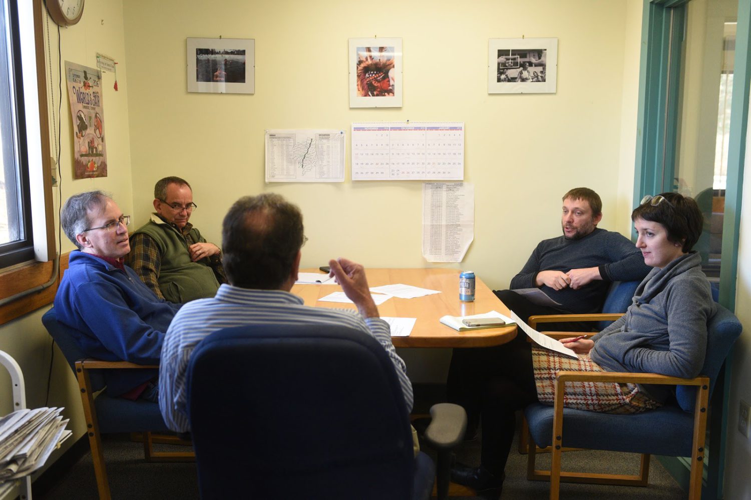 Valley News Web Editor Maggie Cassidy, right, participates in the weekly planning meeting at the Valley News in West Lebanon, N.H., on Dec. 4, 2018. From left are Photo Editor Geoff Hansen, News Editor John Gregg, Editor Martin Frank and Features Editor Alex Hanson. Cassidy has been named the newspaper's next Editor, starting the job on Dec. 17. (Valley News - Jennifer Hauck) Copyright Valley News. May not be reprinted or used online without permission. Send requests to permission@vnews.com.