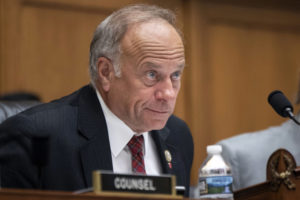 U.S. Rep. Steve King (R-Iowa) listens during a hearing on Capitol Hill in 2018. On Tuesday, the House voted 416-1 for a resolution repudiating King’s words expressing puzzlement about why terms like “white nationalist” are offensive. (AP Photo/J. Scott Applewhite)