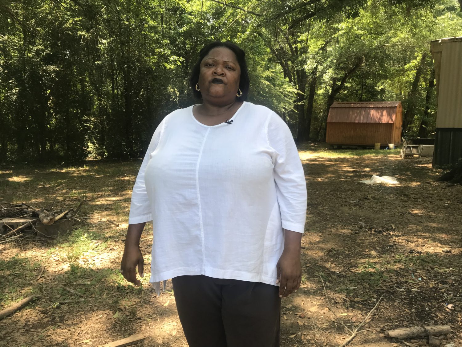 Because she can't afford a septic tank, Pamela Rush's wastewater flows out into her yard in rural Alabama through a process called “straight-piping.” Rush says she believes it has led to health problems for her children. Her story was featured in Southerly. (Photo: Clancy Calkins for Southerly)