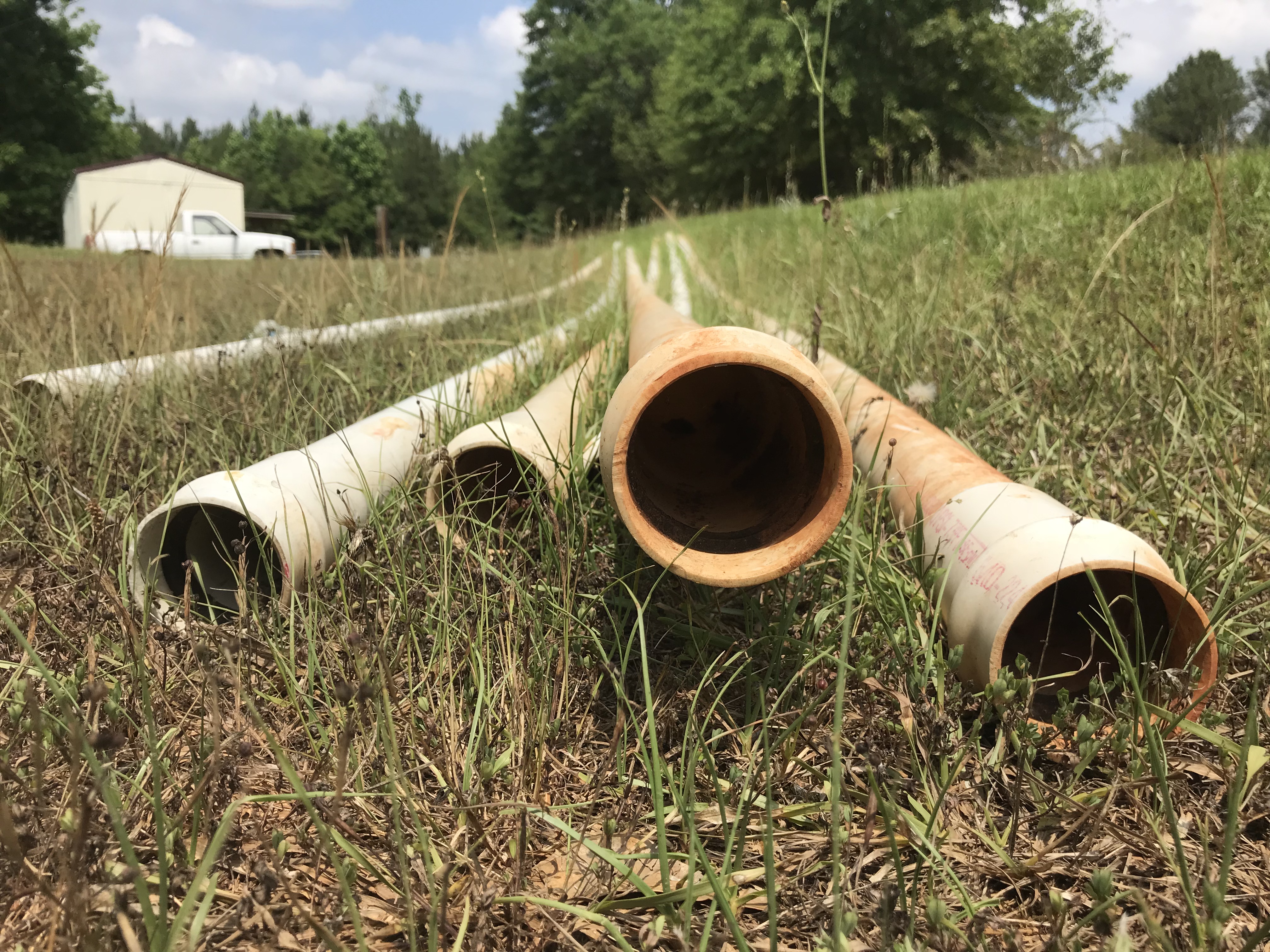 Pipes in a Lowndes County, Alabama, yard. In 2018, Southerly launched with a series of stories on public health and failing sewage infrastructure in the rural South. (Photo: Clancy Calkins for Southerly)