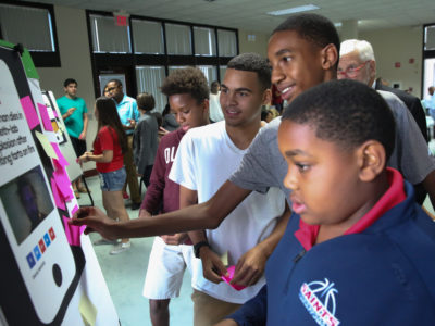 Teenagers work together to determine whether a "Florida Man" story is true or false at a MediaWise teaching event in St. Petersburg, Florida in 2018. Since then, MediaWise has taught thousands of students in more than 30 schools across the country.
