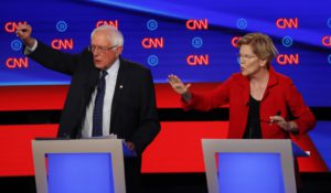 Sen. Bernie Sanders (I-Vt.) and Sen. Elizabeth Warren (D-Mass.) during in the first of two Democratic presidential primary debates hosted by CNN this week in Detroit. (AP Photo/Paul Sancya)