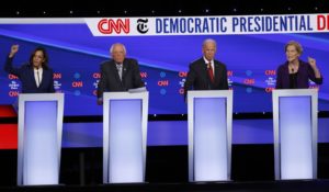 From left, Democratic presidential candidates Kamala Harris, Bernie Sanders, Joe Biden and Elizabeth Warren at Tuesday night’s Democratic presidential primary debate. (AP Photo/John Minchillo)