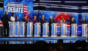 The Democratic presidential candidates at Wednesday night’s primary debate. (AP Photo/John Bazemore)
