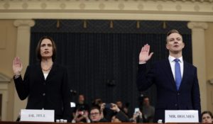 Former White House national security aide Fiona Hill, left, and David Holmes, a U.S. diplomat in Ukraine, are sworn in to testify before the House Intelligence Committee on Capitol Hill on Thursday. (AP Photo/Andrew Harnik)