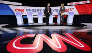 The stage before Tuesday’s Democratic presidential debate.  (AP Photo/Charlie Neibergall)