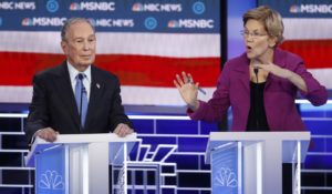 Democratic presidential candidates Mike Bloomberg, left, and Elizabeth Warren during Wednesday night’s debate in Las Vegas. (AP Photo/John Locher)