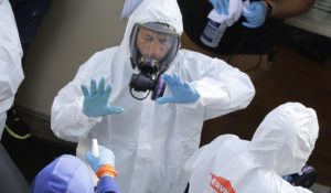 Cleaning workers at a nursing home near Seattle. (AP Photo/Ted S. Warren)