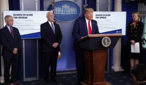 President Donald Trump speaks to reporters about the coronavirus on Tuesday. (AP Photo/Alex Brandon)