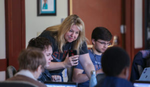 Barbara Allen, director of college programming for Poynter, works with students in the MediaWise Voter Project Campus Correspondent program. (Chris Zuppa for Poynter)