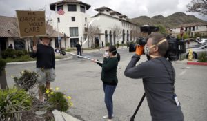 Reporters covering a coronavirus story earlier this week in California. (AP Photo/Marcio Jose Sanchez)