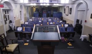 The lectern used by President Donald Trump for the briefings about the coronavirus. Might we see more empty rooms in the future? (AP Photo/Alex Brandon)