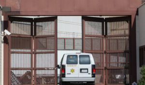A Los Angeles County Sheriff's Department van enters the Twin Towers Correctional Facility in Los Angeles on Wednesday, April 1, 2020. (AP Photo/Damian Dovarganes)