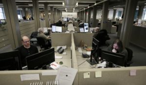 This is the newsroom at The Berkshire Eagle newspaper, in Pittsfield, Massachusetts, last year. Might there come a time when newspapers no longer work from offices like this? (AP Photo/Steven Senne)