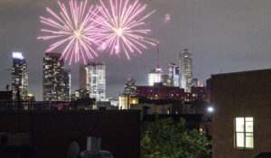 Fireworks explode above Brooklyn during Juneteenth celebrations. This year, fireworks aren't being saved for special events. They've become a nightly nuisance from Connecticut to California. (AP Photo/John Minchillo)