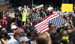 People march to protest the death of George Floyd in Houston on Tuesday. (AP Photo/David J. Phillip)