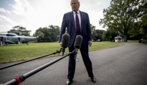 President Donald Trump speaks to the media on the White House lawn on Monday. (AP Photo/Andrew Harnik)