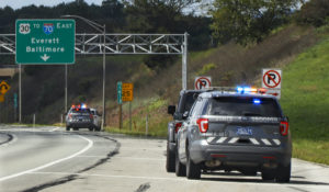 Pennsylvania State troopers pull over vehicles on Friday, Sept. 4, 2020, along the Pennsylvania Turnpike in Breezewood. Police around the country are reporting that as roads and highways emptied during the pandemic, some remaining drivers took advantage by pushing well past the speed limit. It's a trend that statistics show is continuing even as states reopen. (AP Photo/Keith Srakocic)