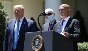 Moncef Slaoui, the immunologist who runs the Trump administration’s Operation Warp Speed program to develop vaccines against the coronavirus, speaks about the coronavirus in the Rose Garden of the White House, Friday, May 15, 2020, in Washington. (AP Photo/Alex Brandon)