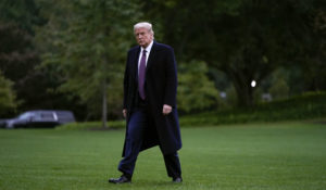 President Donald Trump walks from Marine One to the White House in Washington, Thursday, Oct. 1, 2020, as he returns from Bedminster, N.J. (AP Photo/Carolyn Kaster)