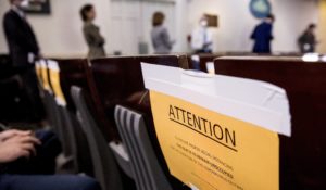 Reporters waiting in line to get COVID tested to cover a press conference at the White House. (AP Photo/Andrew Harnik)