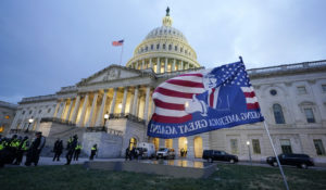 Trump supporters left a flag outside the Capitol, Wednesday evening, Jan. 6, 2021, in Washington. (AP Photo/Manuel Balce Ceneta)