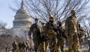 Members of the National Guard patrol outside the Capitol Building on Thursday. (AP Photo/Andrew Harnik)