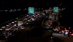 Heavy traffic caused by a multiple vehicle crash is seen on the 695 Highway near the Route 1 offramp, Thursday, Jan. 9, 2020, in Baltimore. (AP Photo/Julio Cortez)