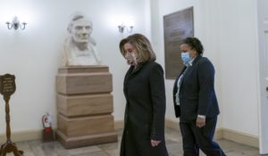 Speaker of the House Nancy Pelosi (D-Calif.) arrives at the Capitol in Washington on Monday on the eve of the second impeachment trial of former President Donald Trump. (AP Photo/J. Scott Applewhite)