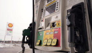 Gas prices are displayed on a pump at a Shell gas station in Westwood, Massachusetts. (AP Photo/Steven Senne)