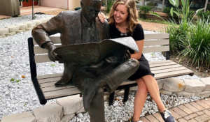 Taylor Blatchford sits in the Poynter courtyard on the last day of her summer fellowship in August 2018. (Courtesy of Taylor Blatchford)