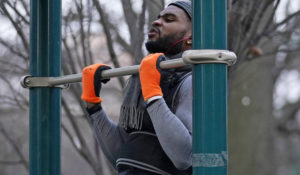 Zay Frection works out in "the gym" at Fort Greene Park, Thursday, Dec. 23, 2020, in the Brooklyn borough of New York. (AP Photo/Kathy Willens)
