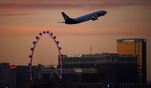 A plane takes off from McCarran International Airport, Tuesday, Feb. 23, 2021, in Las Vegas. (AP Photo/John Locher)