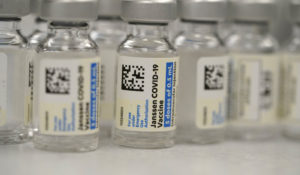 Vials of Johnson and Johnson COVID-19 vaccine sit in the pharmacy of National Jewish Hospital for distribution early Saturday, March 6, 2021, in east Denver. (AP Photo/David Zalubowski)