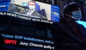 News of the verdict in the trial of former Minneapolis police Officer Derek Chauvin is displayed on a billboard in Times Square in New York on Tuesday. (AP Photo/Seth Wenig)