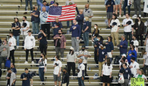 Fans stand during the playing of the national anthem before a baseball game between the New York Yankees and the Houston Astros Tuesday, May 4, 2021, in New York. (AP Photo/Frank Franklin II)