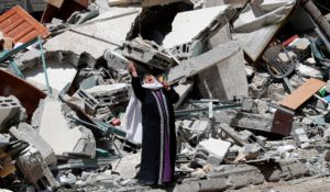 The rubble of a building that was destroyed by an Israeli airstrike on Saturday that housed The Associated Press, broadcaster Al-Jazeera and other media outlets. (AP Photo/Adel Hana)