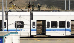 Law enforcement officers respond to the scene of a shooting at a Santa Clara Valley Transportation Authority (VTA) facility on Wednesday, May 26, 2021, in San Jose, Calif. Santa Clara County sheriff’s spokesman said the rail yard shooting left multipole people, including the shooter, dead. (AP Photo/Noah Berger)