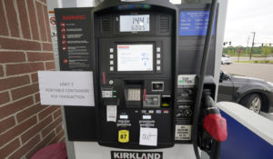 Several fuel pumps were out of premium gasoline in addition to limiting the fillup of portable containers at this Costco Warehouse fuel station, Tuesday, May 11, 2021, in Ridgeland, Miss., following “panic buying” after a ransomware attack shut down the Colonial Pipeline. (AP Photo/Rogelio V. Solis)