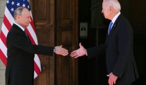 Russian President Vladimir Putin, left, and U.S President Joe Biden shake hands during their meeting at the 'Villa la Grange' in Geneva, Switzerland in Geneva, Switzerland, Wednesday, June 16, 2021. (AP Photo/Alexander Zemlianichenko, Pool)