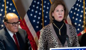 Sidney Powell, right, speaks next to former Mayor of New York Rudy Giuliani, as members of President Donald Trump's legal team, during a news conference at the Republican National Committee headquarters in November of 2020. They made baseless claims of a rigged election. (AP Photo/Jacquelyn Martin, File)