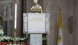 Archbishop Timothy Broglio conducts an Easter Sunday Mass at Basilica of the National Shrine of the Immaculate Conception in Washington, Sunday, April 12, 2020. (AP Photo/Jose Luis Magana)