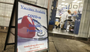 A pharmacy in New York City offers vaccines for COVID-19, flu, shingles and pneumonia on Monday, December 6, 2021. (AP Photo/Ted Shaffrey)
