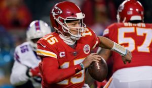 Kansas City Chiefs quarterback Patrick Mahomes (15) looks to pass during the playoff game against the Buffalo Bills on Sunday. (AP Photo/Charlie Riedel)